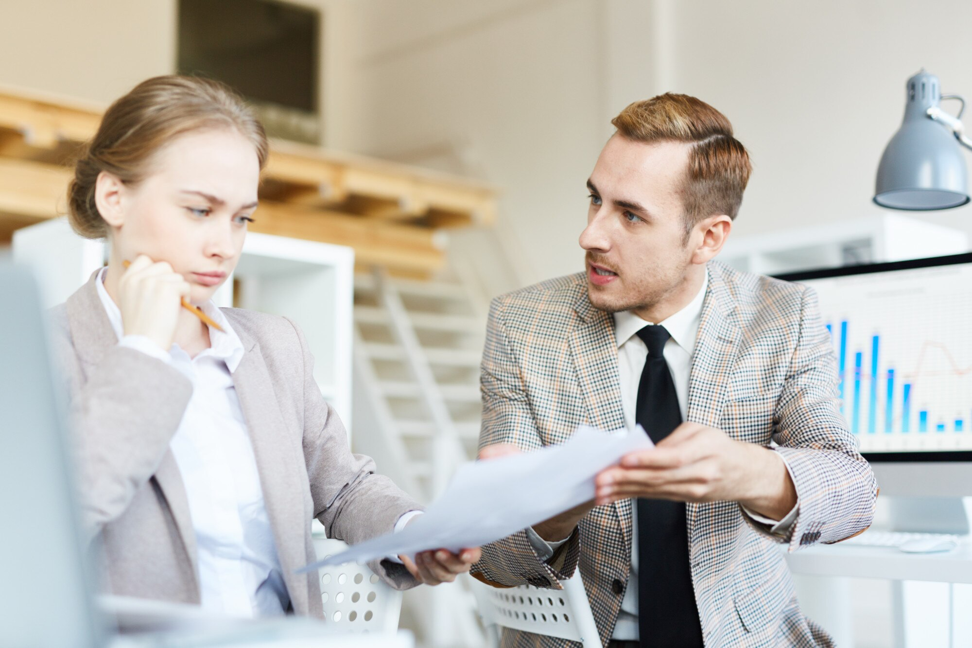 Real estate advisor consulting with client